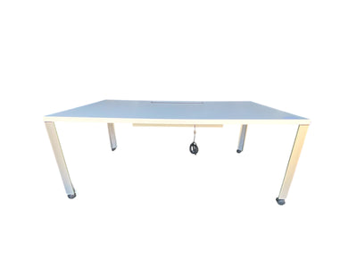 Steelcase Mobile Table Desk with Power – 72" x 36". White top top with silver legs.