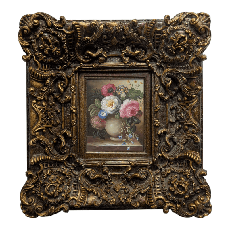 Framed painting of flowers in vase
