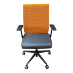 Intelligent Ergonomic Task Chair with Black Seat and Orange Mesh Back | Steelcase Think V1