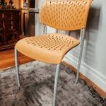 used Izzy+ Orange Stacking Chair