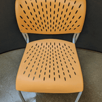 used Izzy+ Orange Stacking Chair