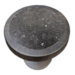 Polyform Round 13 Black Granite Top Wood Frame End Table This Polyform Round End Table is a perfect blend of style and functionality. Featuring a sleek black granite top and a sturdy wood frame, this end table is designed to add a touch of elegance to any room it is placed in. Measuring 13 inches in diameter, it is the perfect size for holding drinks, books, or other small items. The black granite top provides a smooth surface that is easy to clean and maintain. The wood frame is designed to be durable and 